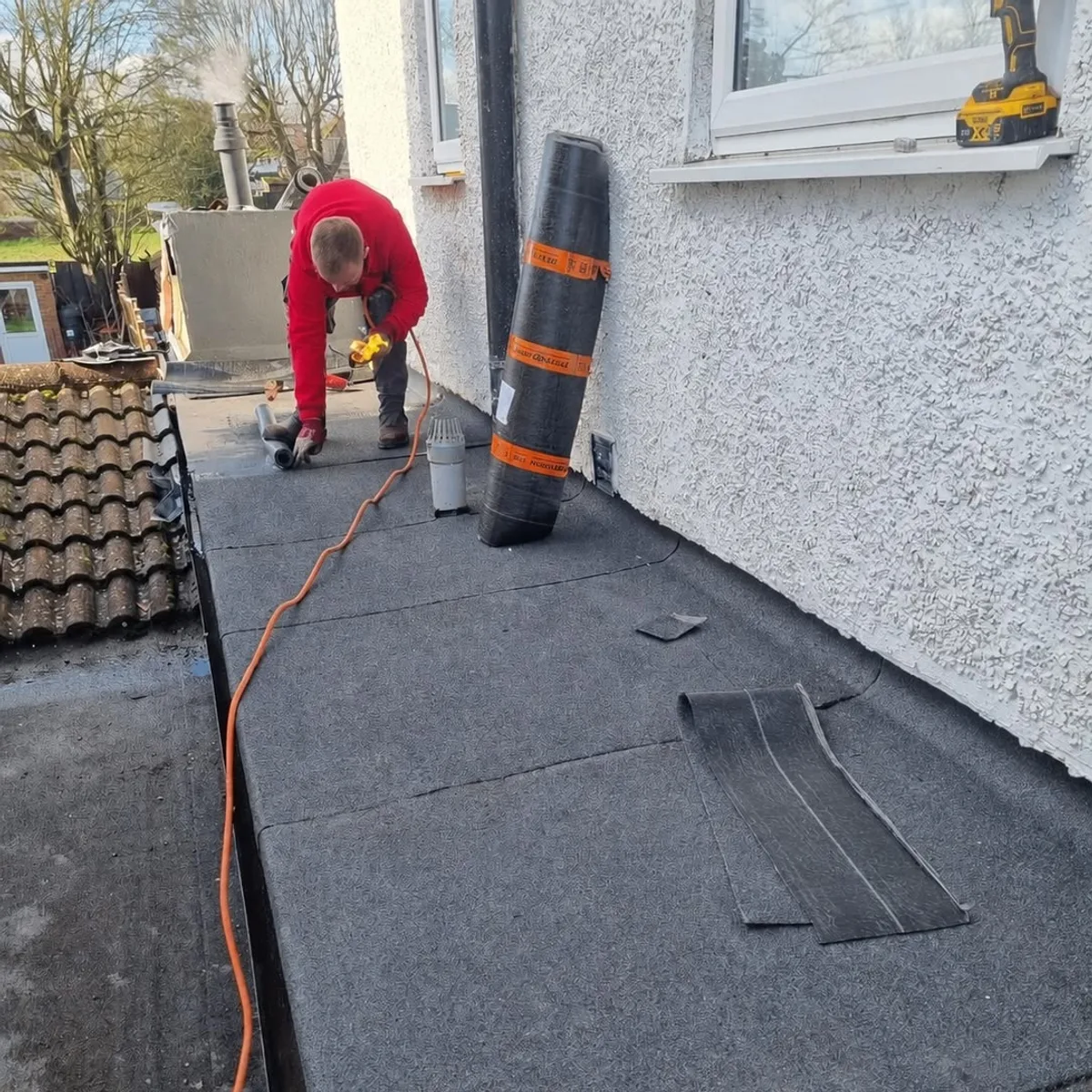 Flat roof around soil pipe