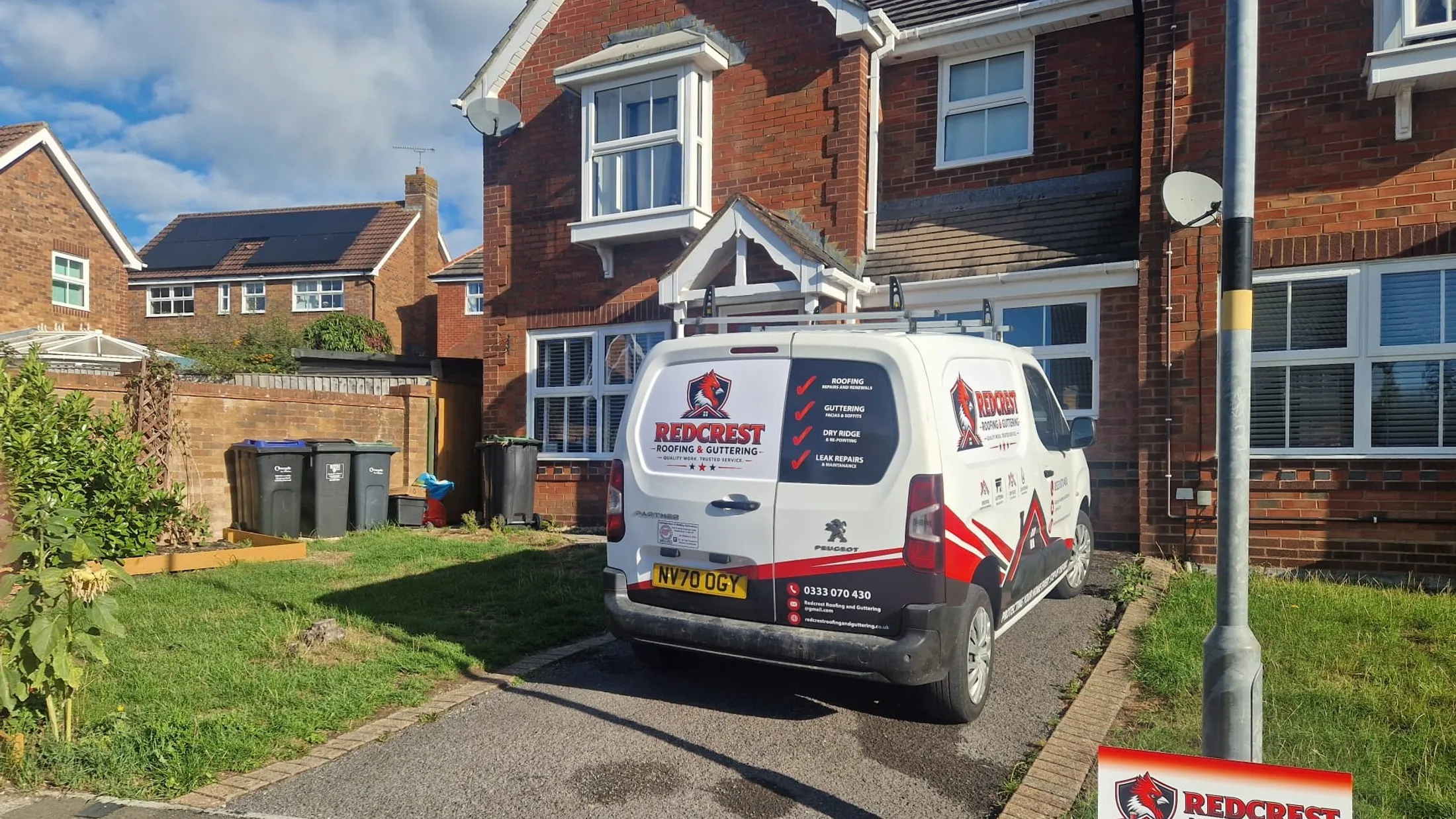 The sign-written Redcrest van outside a home in Berkshire